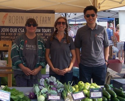 FIle photo of the folks from Robin Hills Farm at the Saturday Farmers Market.