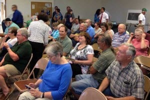 The audience gathers prior to the MDOT meeting at Sylvan Township Hall on Monday evening.