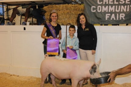 File photo. Grand Champion pig, owned by Jack McCalla weighed 270 pounds and was purchased by Lehman and Schaeffler Real Estate Services for $5.25 per pound. 