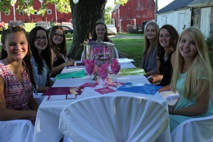This year's fair queen candidates during their tea party .