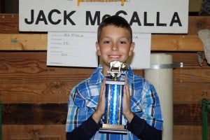 Jack McCalls, who won individual grand champion with one of his pigs.