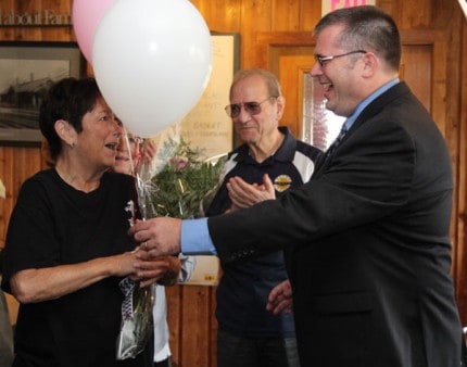 Lynda Collins was surprised by Chamber President Ian Boone with balloons as she was named the 2015 Lifetime Achievement Winner.