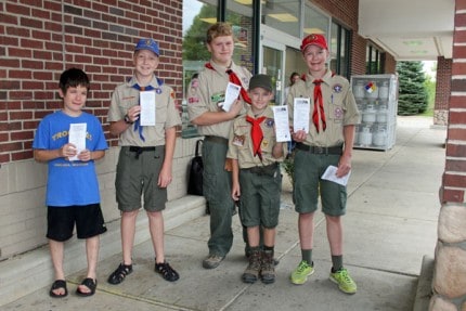 Scouts from Troops 476 and 425 spent Saturday helping Faith in Action at Polly's through the Scouting for Food Program.
