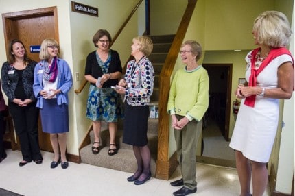 Photo by Burrill Strong. Inside Faith in Action house before the ribbon cutting.