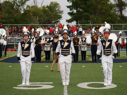 Photo by Susie Catherman. Chelsea High School Marching Band's three drum majors.