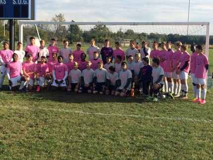 Courtesy photo. Chelsea boys soccer participates in cancer awareness game v. Ypsi.