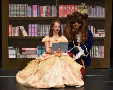 Photo by Wendy Hodel. Maggie Caselli as Belle and Gabe Raines as the Beast.