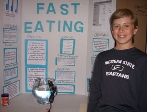 Photo by Lisa Carolin. Nate Banotai wanted to find out if goldfish ate faster in warm water or cold water. 