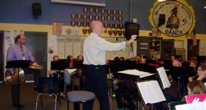 Mr. Otto conducts 6th grade band.