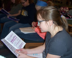 Photo by Lisa Carolin. Studying lines at Beach Middle School Drama Club.