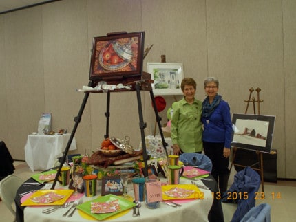 Courtesy photo. Janet Alford and Neta Mills with their “Chelsea Artist’s Studio” table.