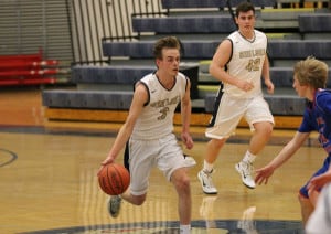 Courtesy photo. Ethan French dribbles the ball.