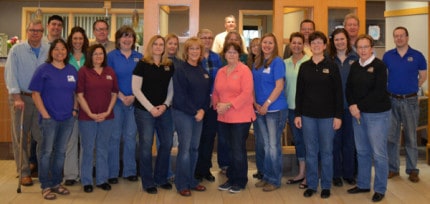 Employees at the main plaza office of Chelsea State Bank wore blue jeans to support a fundraiser for former colleague Colleen Weddon. 