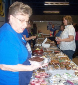 Photo by Lisa Carolin. The senior center bake sale greets folks as they enter the Chelsea Spring Expo.