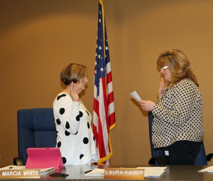 Clerk Laura Kaiser swears in new Chelsea City Council Member Marcia White on April 4.