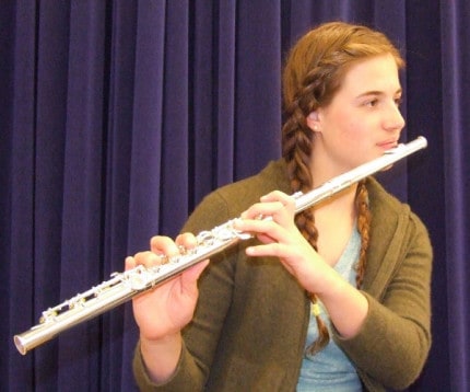 Photo by Crystal Hayduk. Anna Argento playing the flute. 