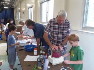 Courtesy photo. Kids learning to cook with produce from the Intergenerational Garden. 