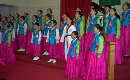Photo by Lisa Carolin. XXX Korean Choir performs.
