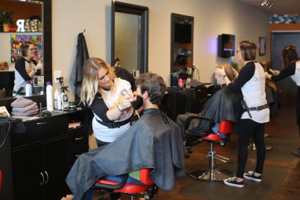 Courtesy photo. Devil's Haircut Salon staff giving haircuts. 