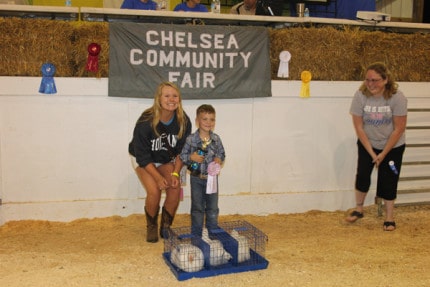 Gar's Plumbing purchased the reserve grand champion pen of chickens from Bo Wacker for $225.