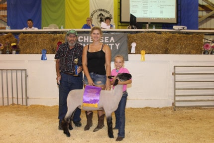 Reuben Lesser bidding for Dr. Portz purchased the grand champion lamb from Mikaela Talbot for $22 per pound. The lamb weighed 136 pounds.