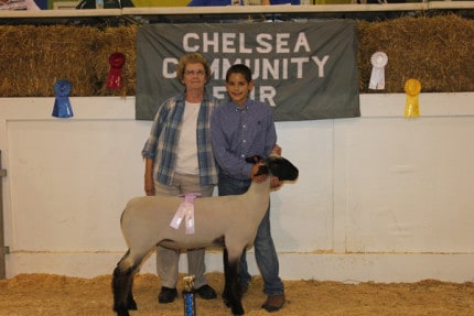 Arlene Bareis purchased the reserve grand champion lamb from Fernando Hermosillo for $22 per pound. The lamb weighed 128 pounds.