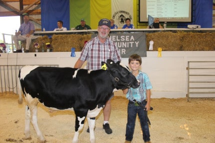 Kern's Auto Service and Sales purchased the grand champion feeder calf from Parker Burchett for $3.25 per pound. The calf weighed 459 pounds. 