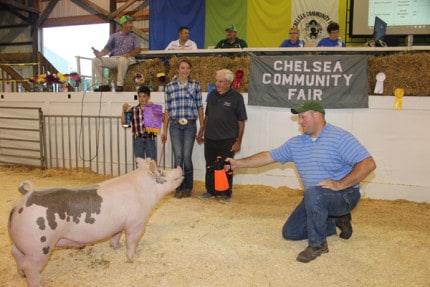 Bob and Carol Breuninger purchased the grand champion pig from Amanda Breuninger for $8.25 per pound. The pig weighed 273 pounds.