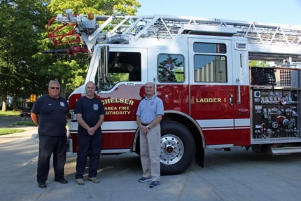 Retired Fire Chief Jim Payeur, CAFA Board Chairman Tom Osborne and Interim Chief Jon Ichesco outside Station 1 on Friday. 