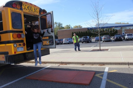 Students learn how to evacuate their bus during a drill Wednesday. 
