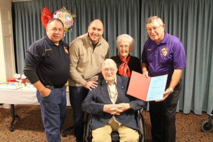 Photo by Joe Yekulis. Centenarian Ed Lirette and wife Alice (center), are joined by Sir Knights Joe Yekulis - Past Faithful Navigator, Ray Singer – Captain, and Don McDevitt – Past Faithful Navigator, who presented Lirette with a special certificate commending him on his 100th birthday and his 61 years in the Knights of Columbus.